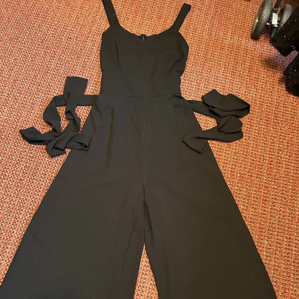 Black V-neck Sleeveless Corset-style Wide Leg Jumpsuit.